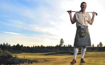 Man Holding Golf Club